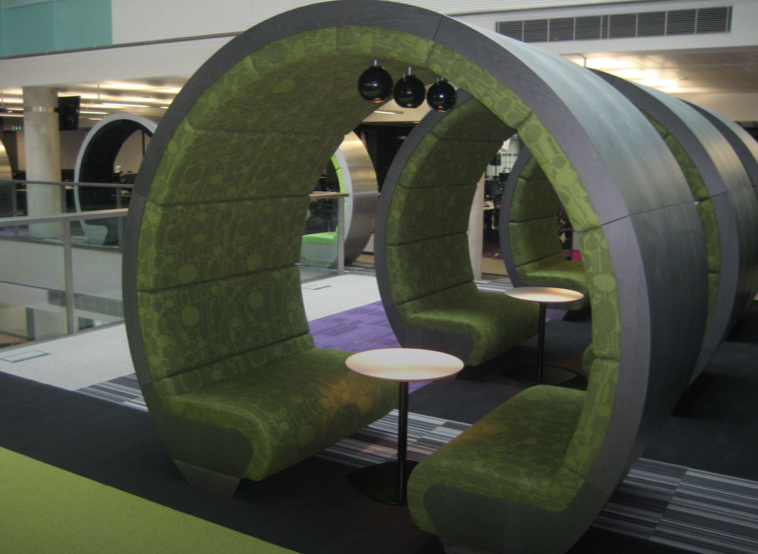 Creative pod seating area in commercial office.